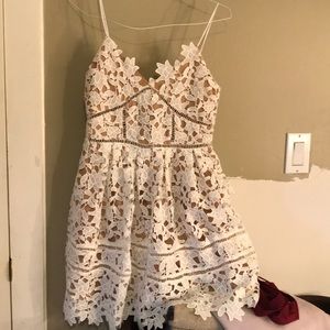 Self protrait style white lace dress
